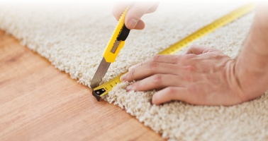 measuring and cutting carpet