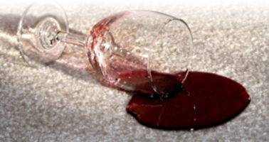 red wine spilled on carpet that is going to leave a stain